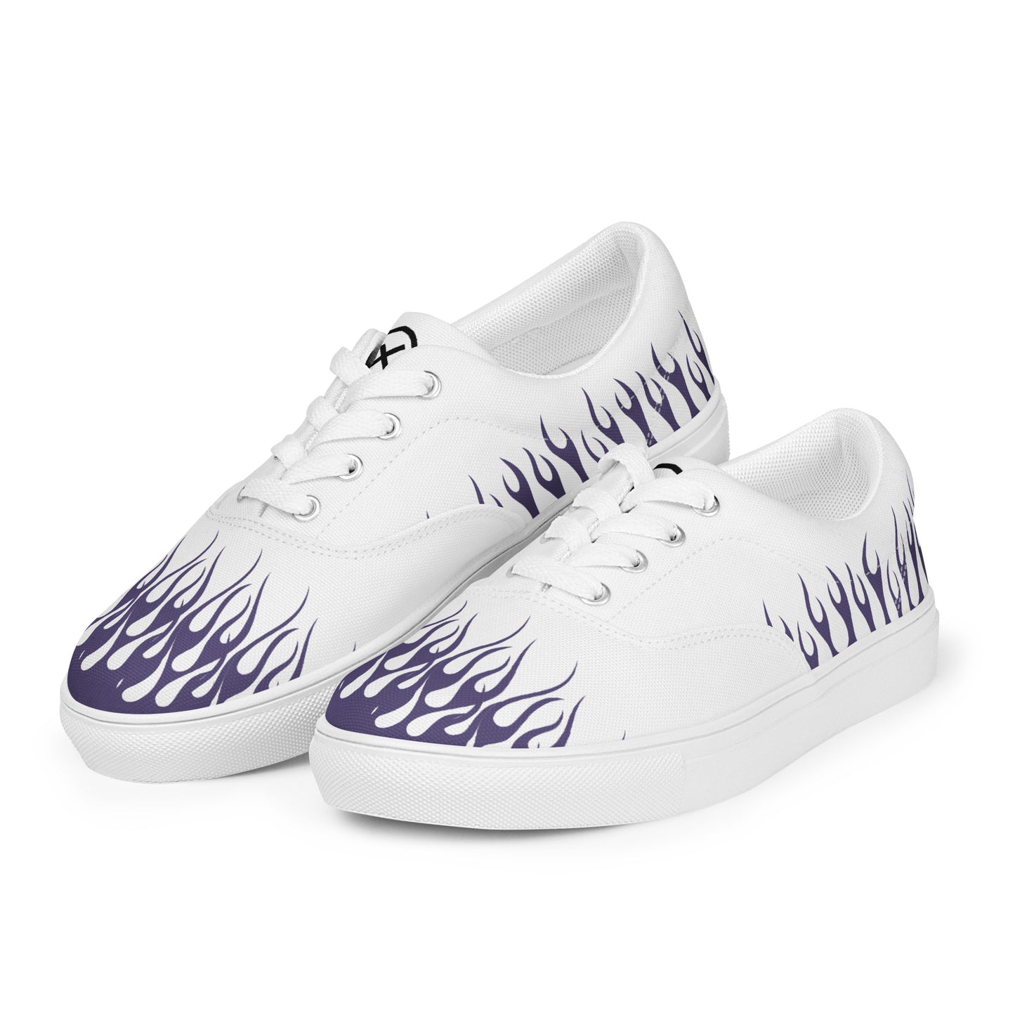 White canvas low-top sneakers with purple flame print and white laces, side view.