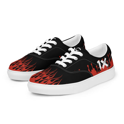 Canvas sneakers pair, black with red flame art, white outsole and white interior lining