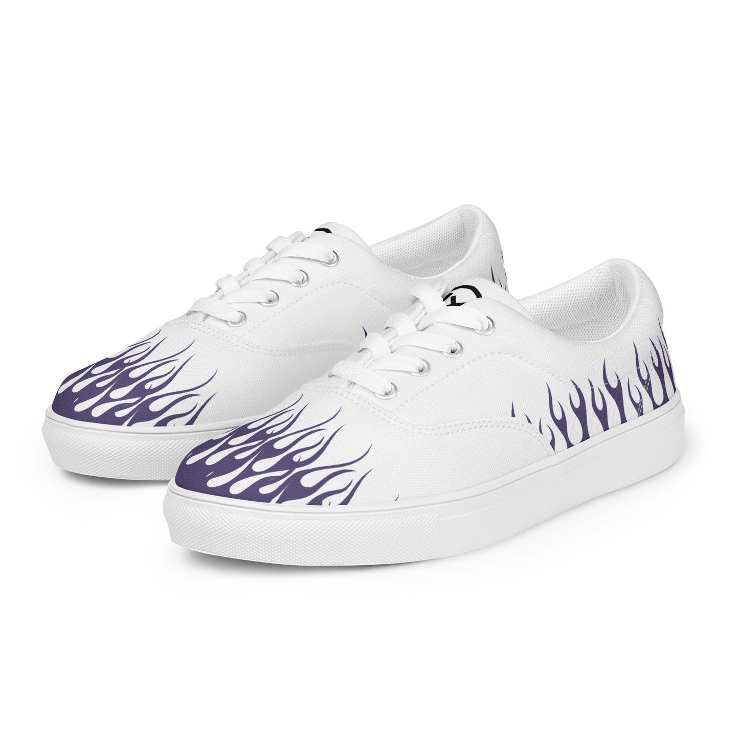 White canvas low-top sneakers with purple flame print, front view.