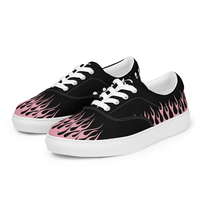 Black canvas low-top sneaker pair with pink flame graphics and white rubber outsole