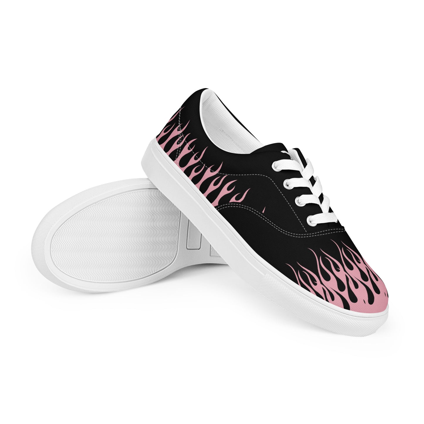 Black canvas sneaker with pink flame side print, white rubber sole, lace-up