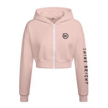 Women’s pink fleece zip-up hoodie with front logo and long sleeve graphic.