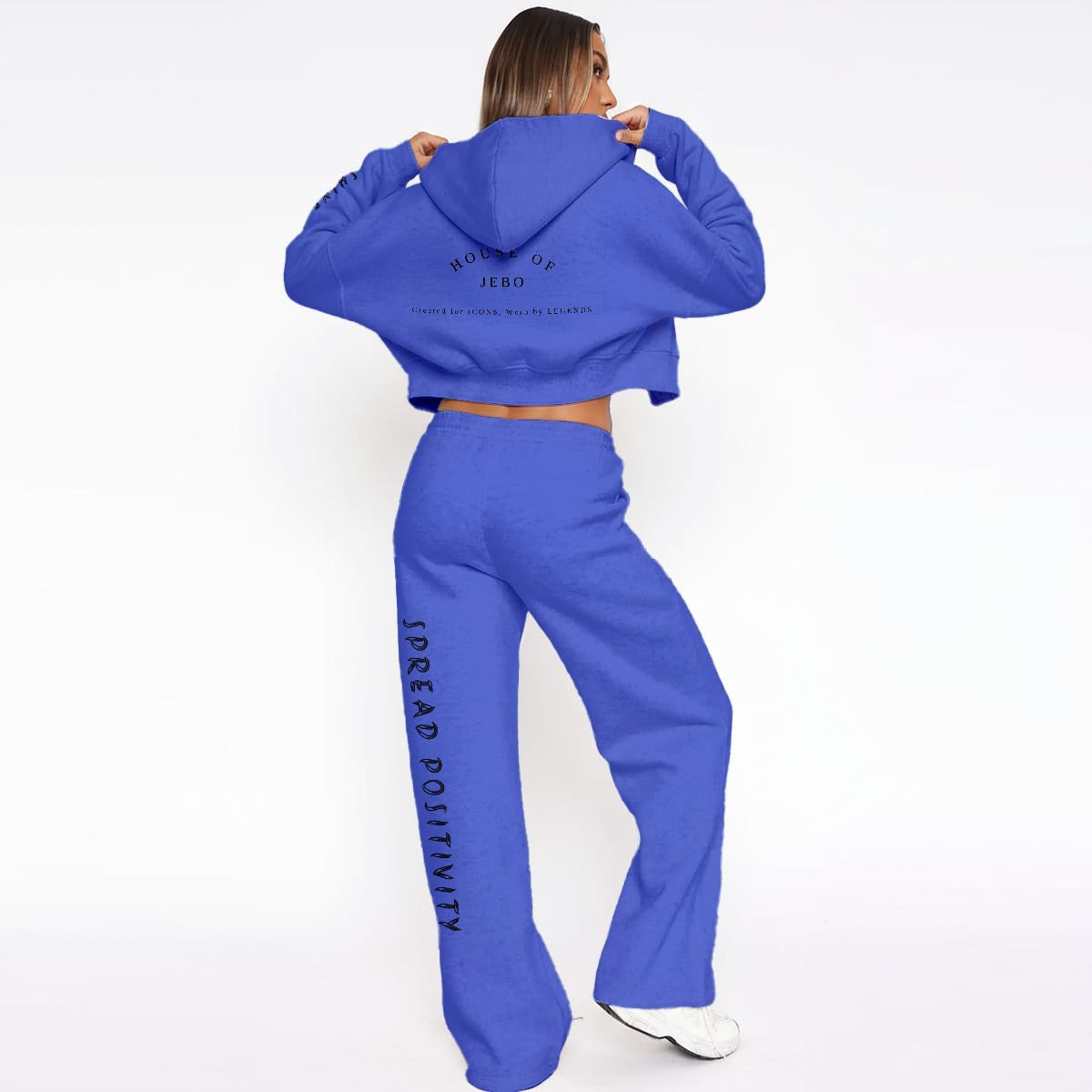 Women’s fleece tracksuit set in blue from back view: cropped hoodie and wide-leg joggers.