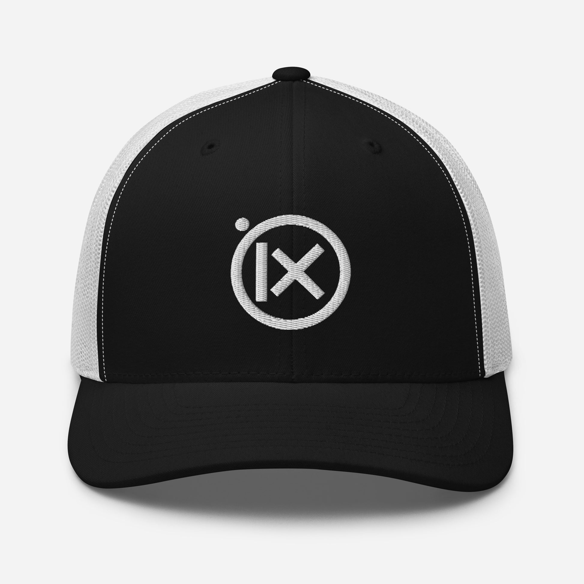 Black front trucker snapback cap with white mesh sides and circular X logo