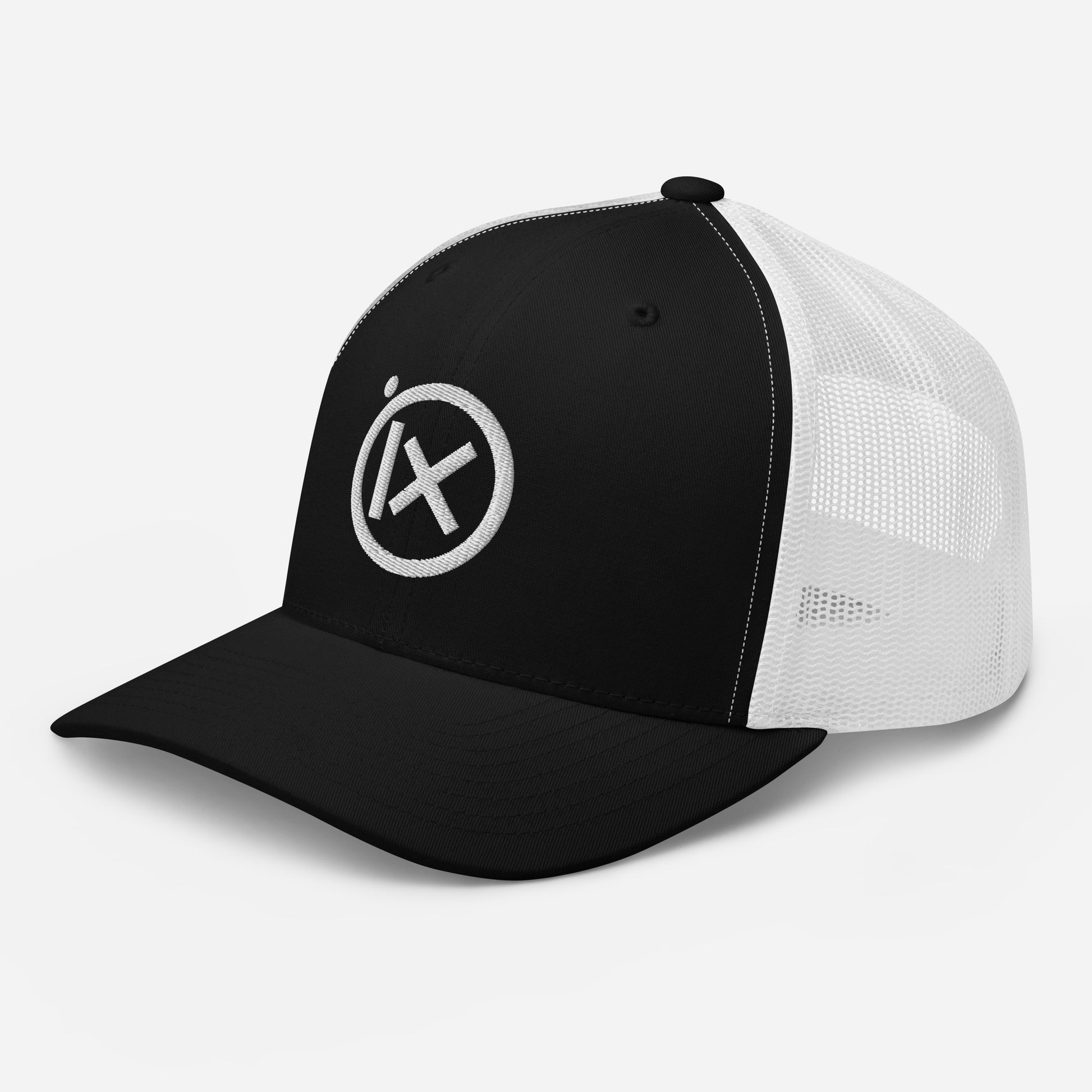 Black and white mesh trucker snapback cap with circular X logo on front