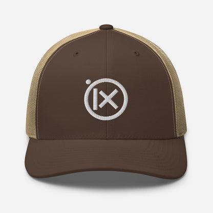 Trucker snapback cap in dark brown with tan mesh and white logo badge