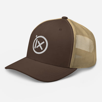 Trucker snapback cap with brown front panel, tan mesh sides, and white logo badge