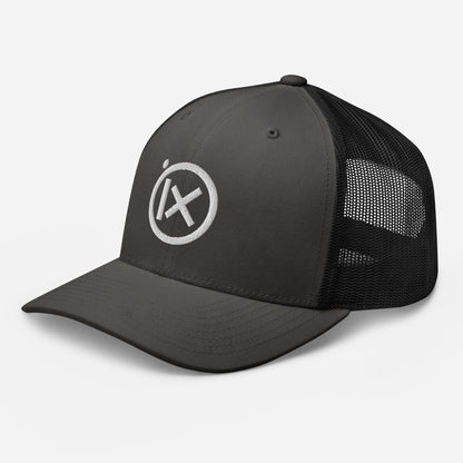 Trucker snapback cap with dark gray front, black mesh sides, and white logo