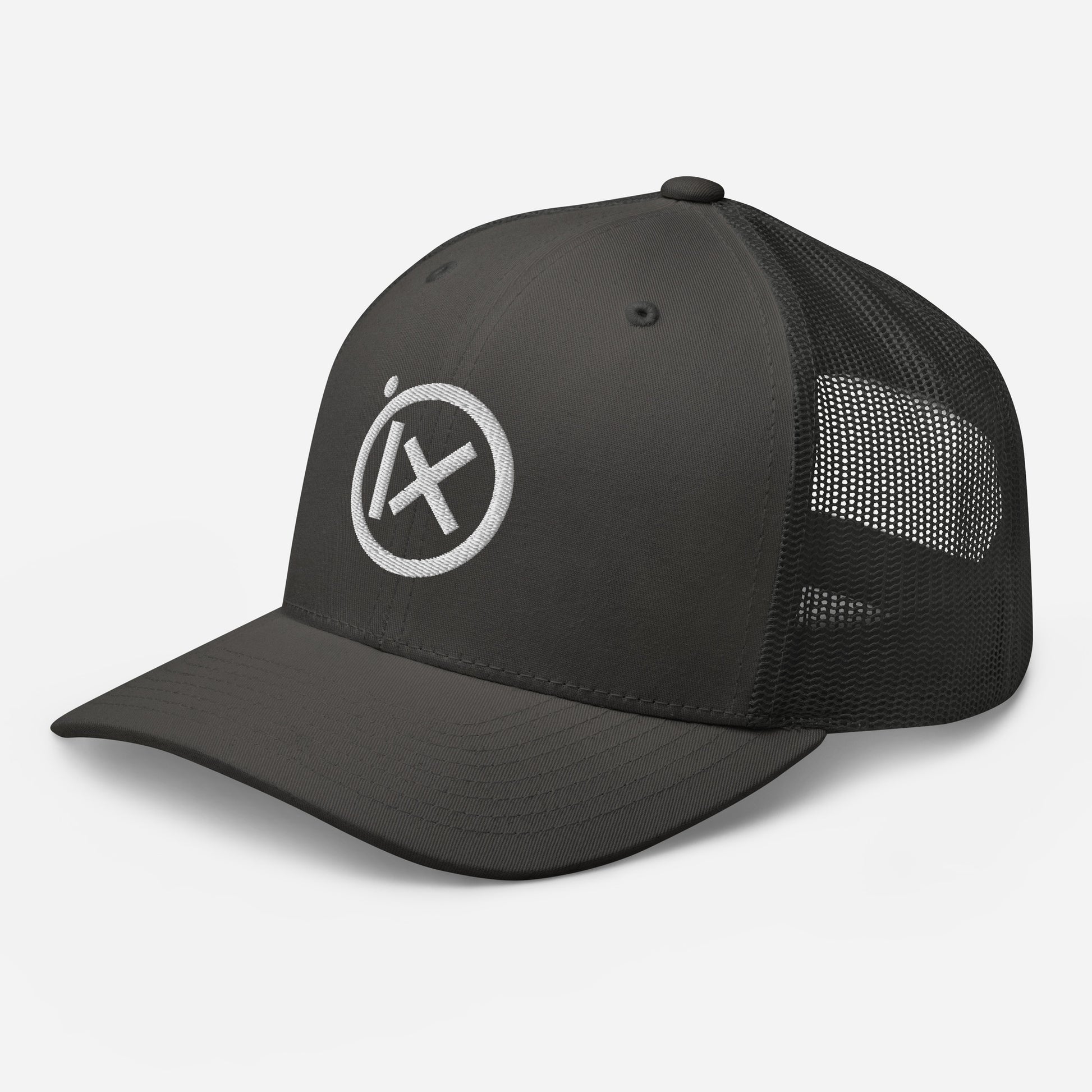 Trucker snapback cap with black crown, black mesh side panels, and round white logo