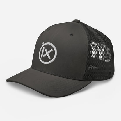 Trucker snapback cap with black crown, black mesh side panels, and round white logo