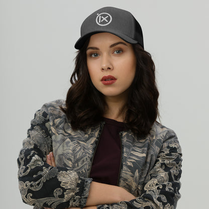 Heather gray trucker snapback hat with white logo patch, curved brim