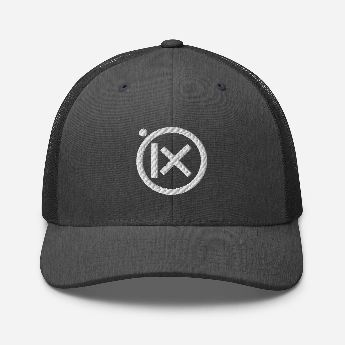 Trucker snapback cap front view, dark crown with round white logo, black mesh back