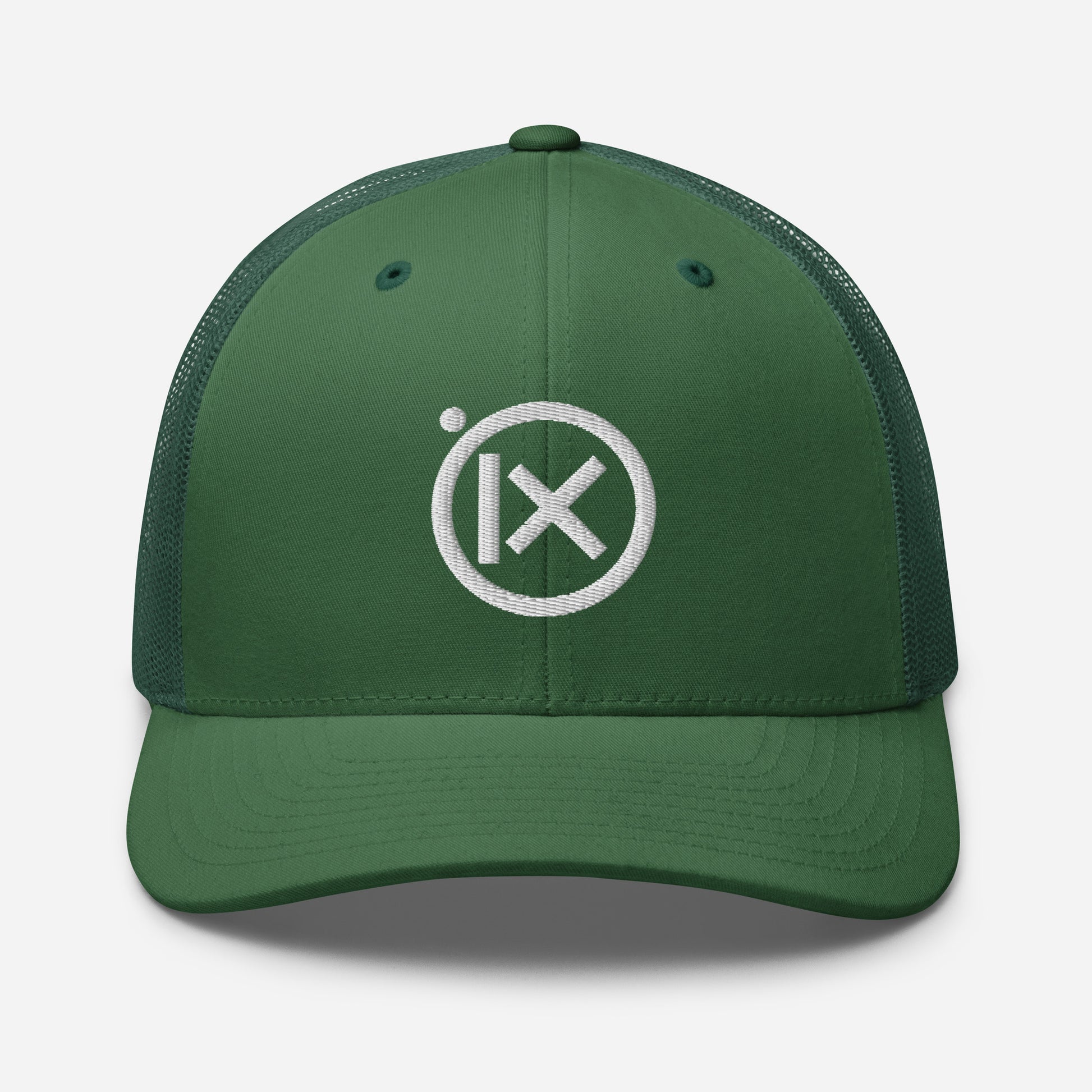 Green trucker snapback cap with circular X logo patch and green front panel.