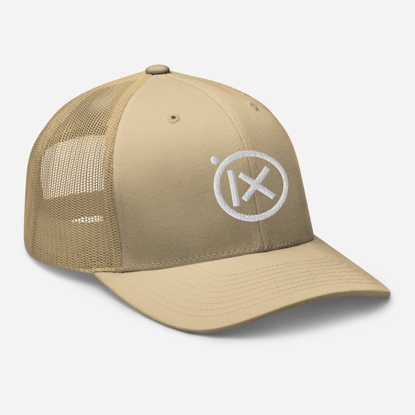 Tan trucker snapback cap with mesh back and white circular X logo on front