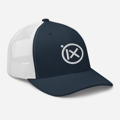 Navy trucker snapback cap with circular iX logo and white mesh side panels