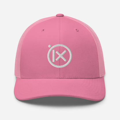Pink trucker snapback cap with mesh back and white circular X logo on front