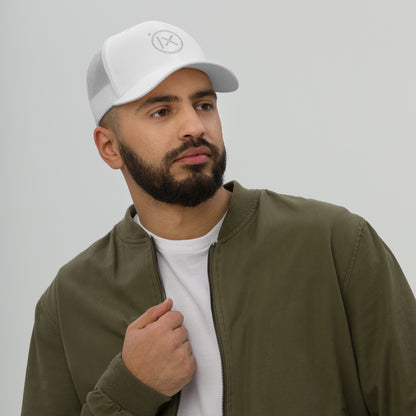 Retro trucker snapback cap in white with mesh back and circular logo emblem