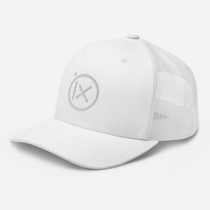 White mesh trucker snapback cap with circular X logo patch on side
