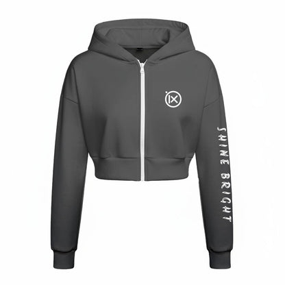 Black zip-up fleece hoodie with hood, front logo badge and sleeve vertical text print.