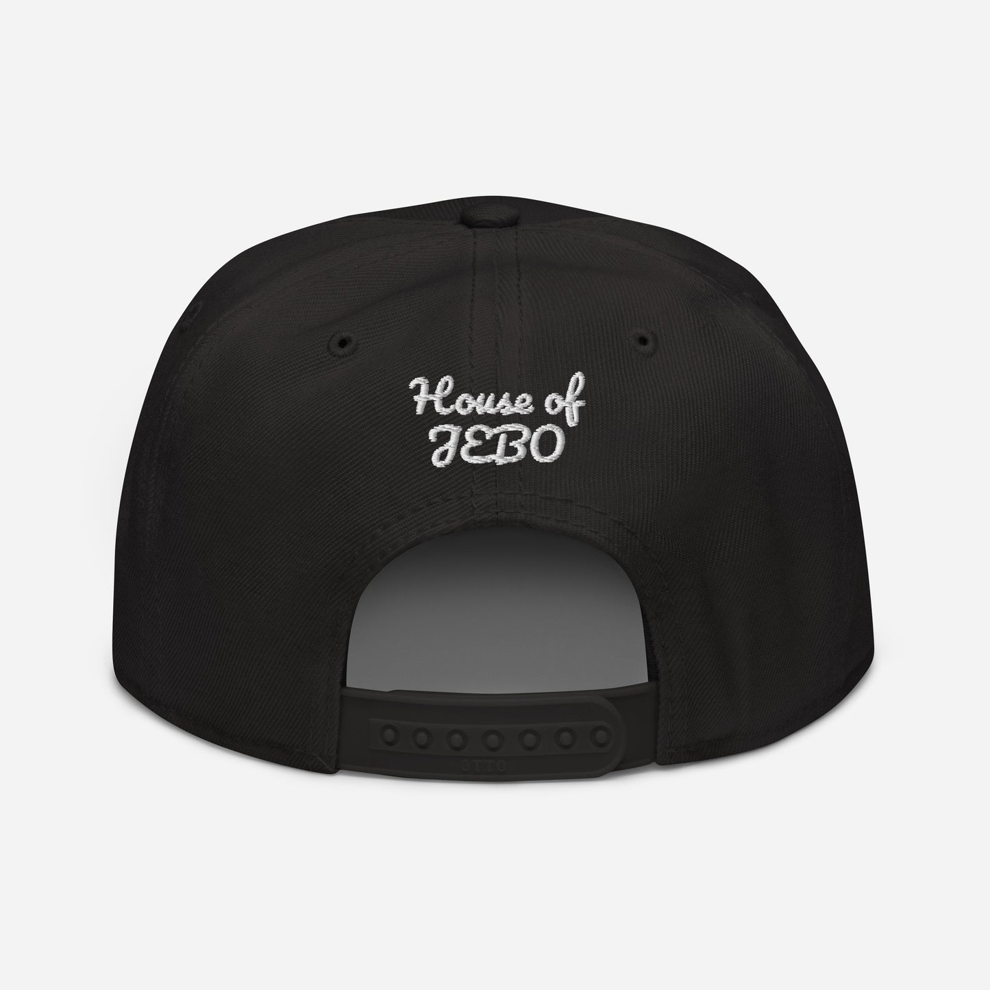 Black snapback cap with small white logo text on the back panel and adjustable strap