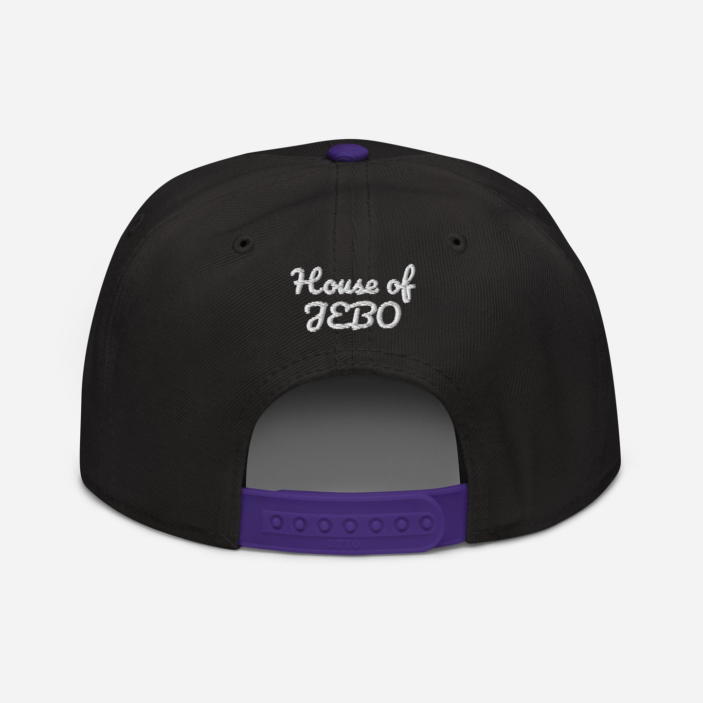 Black snapback cap with purple adjustable strapback and white back logo text