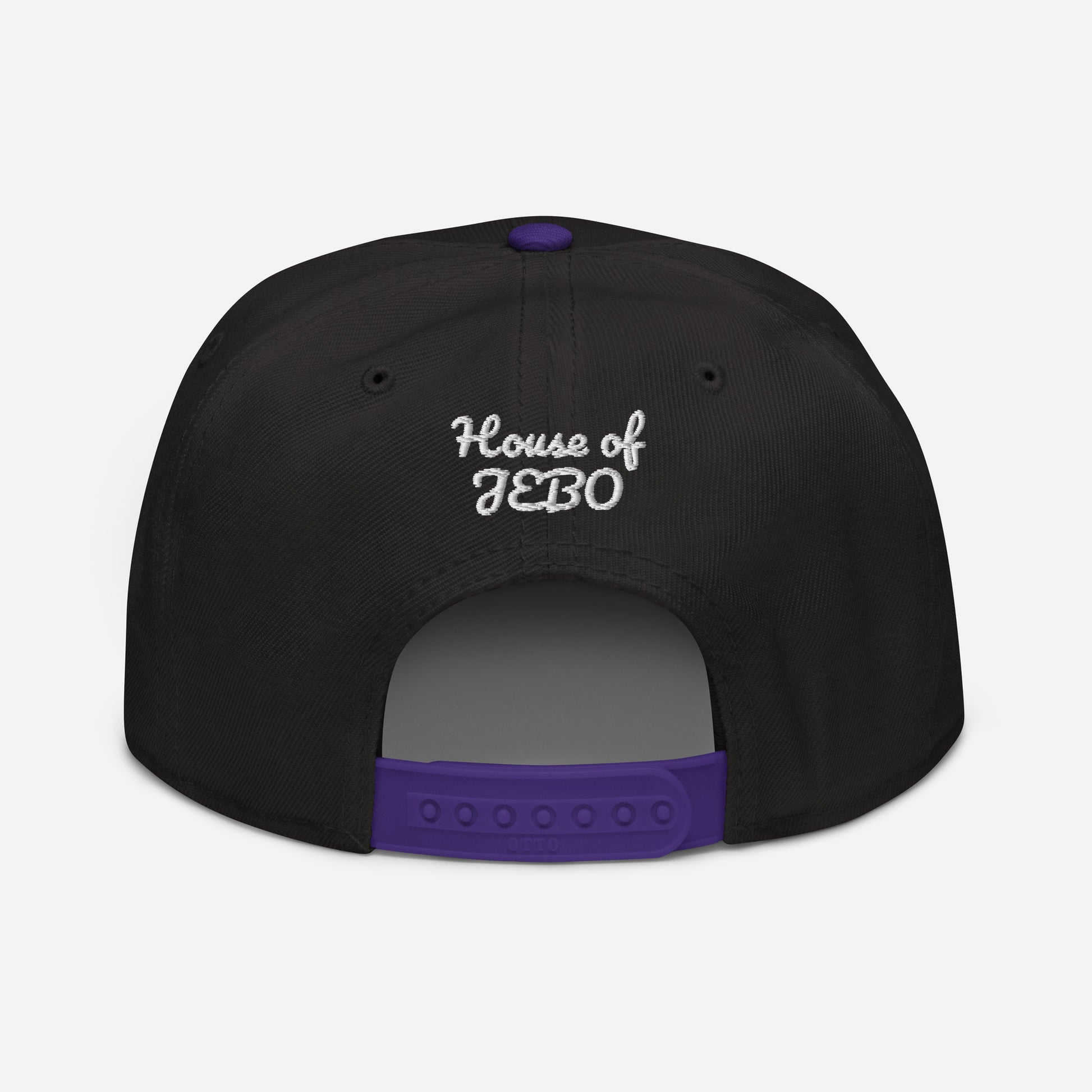 Black snapback cap with purple adjustable strapback and white back logo text