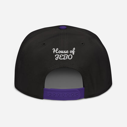 Black snapback cap with purple adjustable strapback and white back logo text