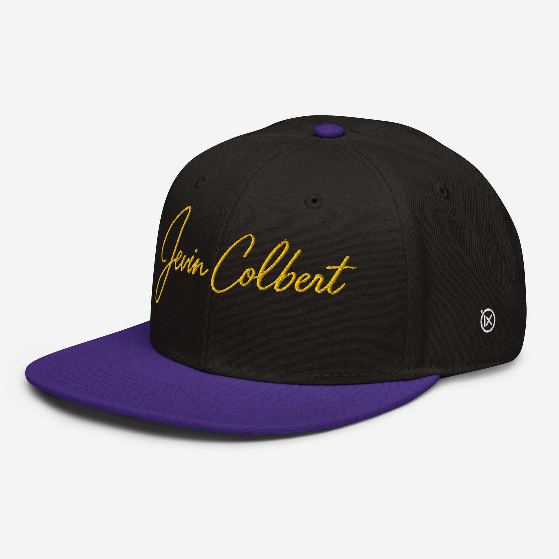 Jevin Colbert snapback cap, black crown with purple brim and yellow script logo