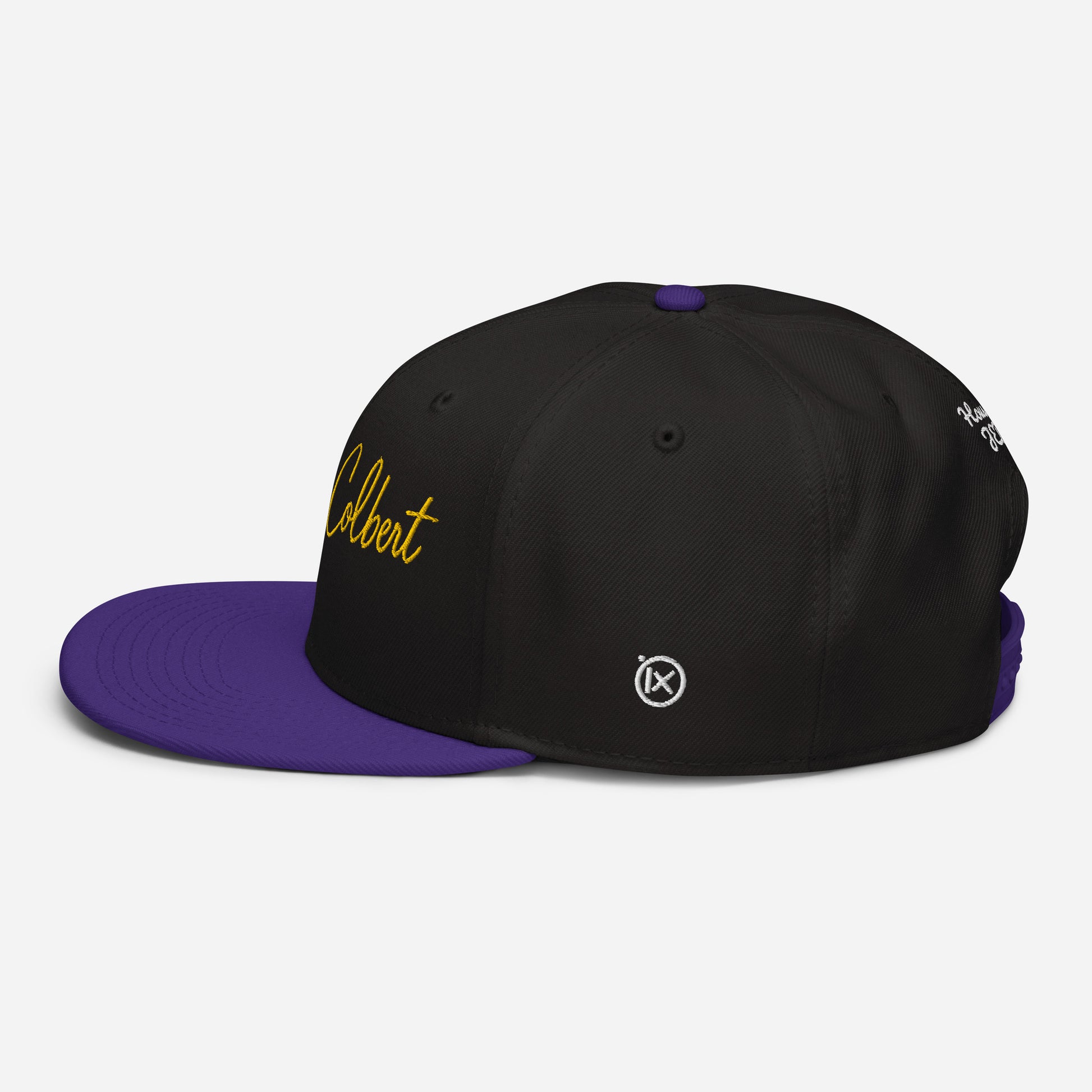 Jevin Colbert snapback cap, black crown with purple brim, yellow logo on side