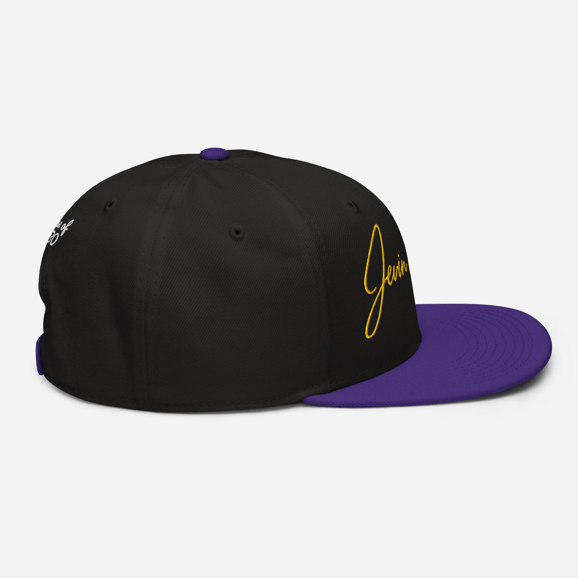 Jevin Colbert snapback cap, black crown with purple brim, yellow logo detail