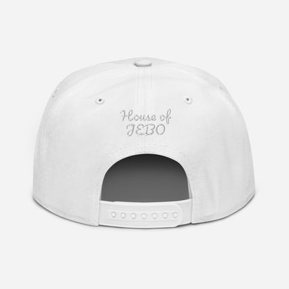 White snapback cap with small gray back logo text and adjustable snap strap