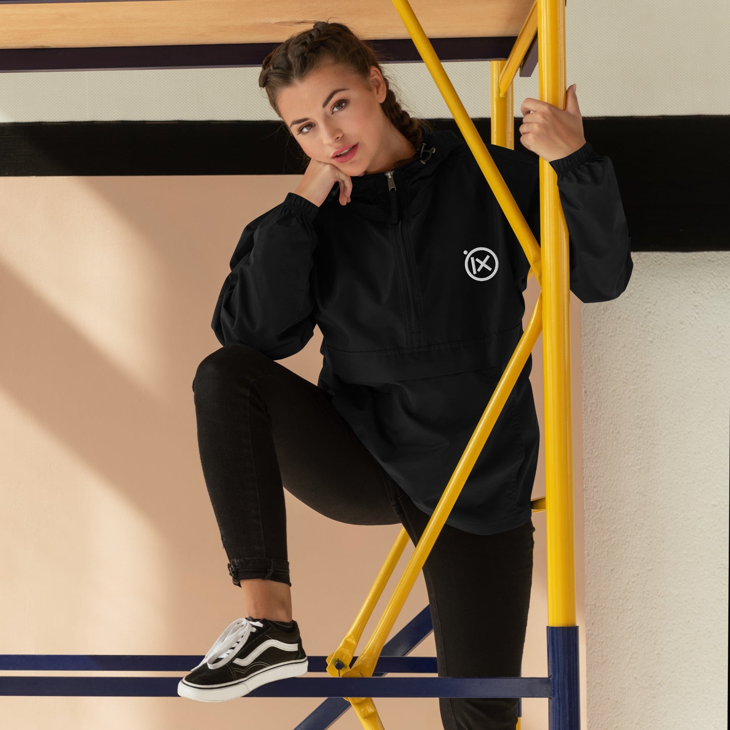 Hooded anorak windbreaker in black with zip front and elastic cuffs
