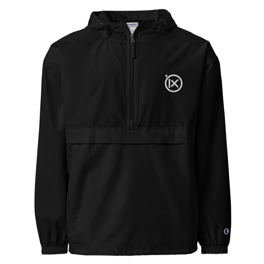 Black anorak windbreaker with hood, quarter-zip, and ix logo patch at chest.
