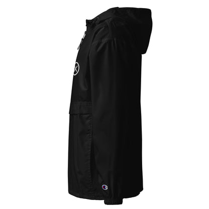 Black anorak windbreaker shown from the side with hood and small sleeve logo.