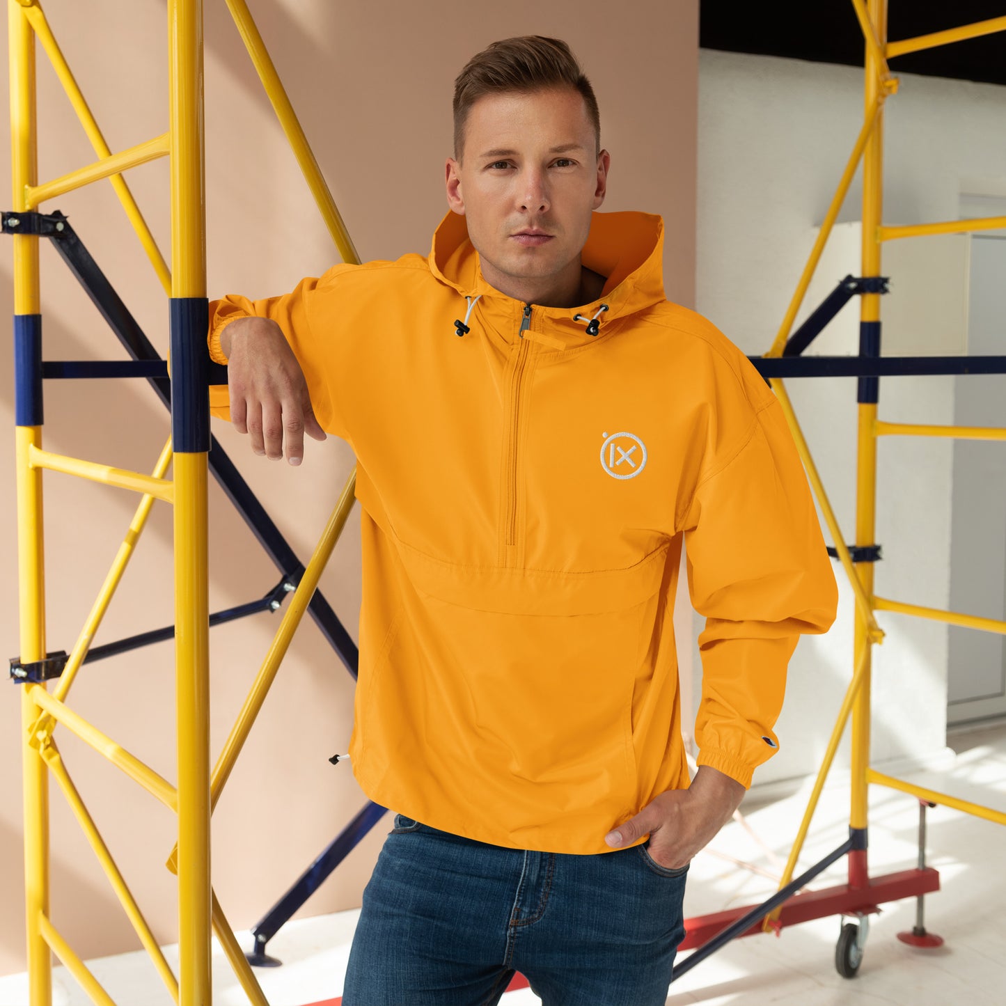 Hooded anorak windbreaker in orange with zip front and adjustable hood