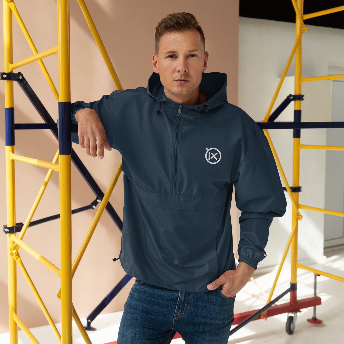 Navy anorak windbreaker worn with hood and front zipper