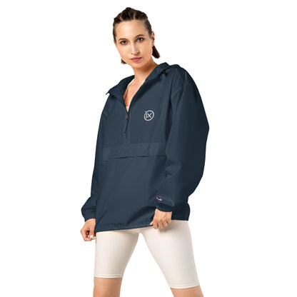 Navy anorak windbreaker on model with hood, half-zip front, and drawcord pulls