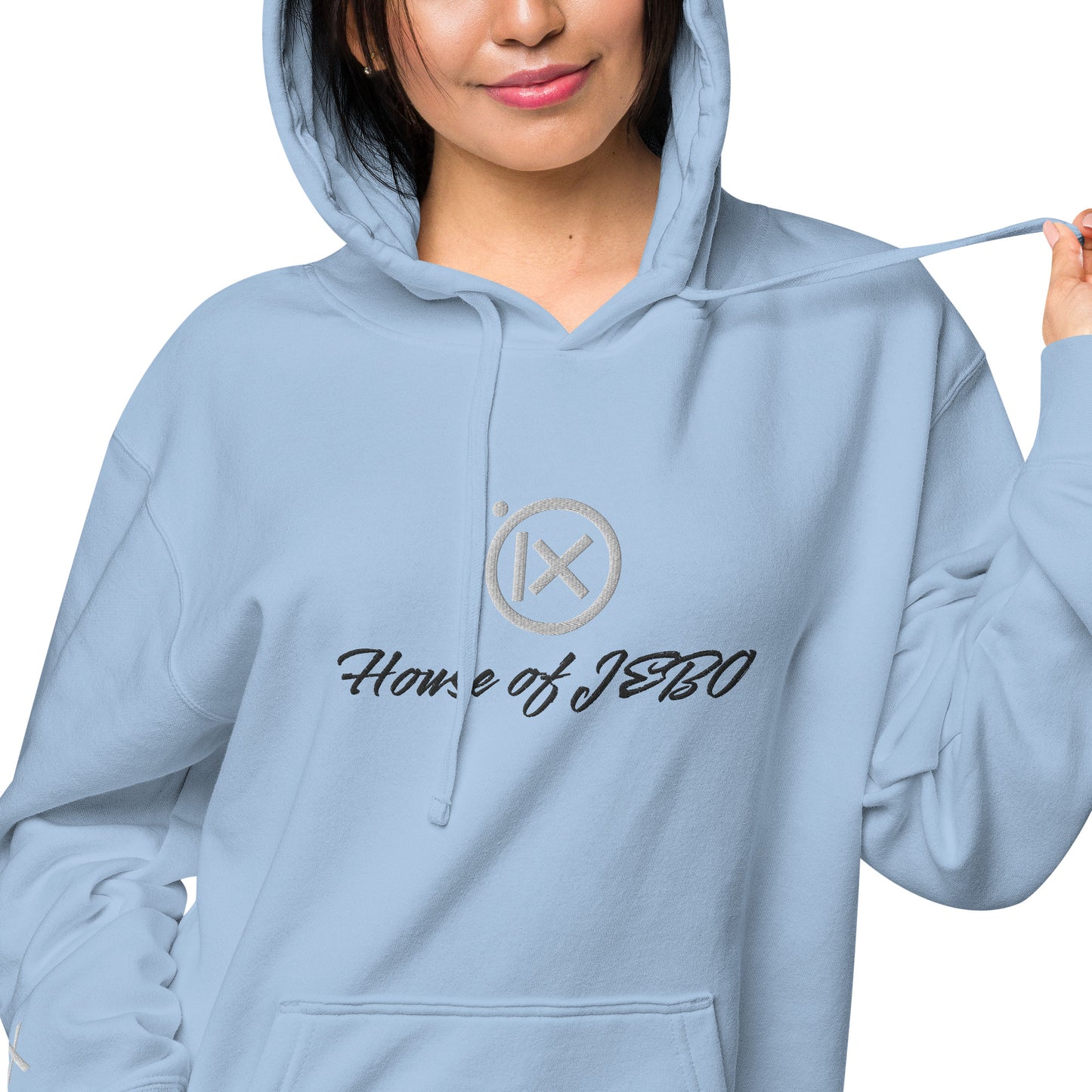 Light blue vintage pigment pullover hoodie with hood, drawstrings, and chest logo