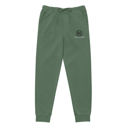 Vintage pigment sweatpants in green, elastic waistband with drawstring, cuffed hems, side logo