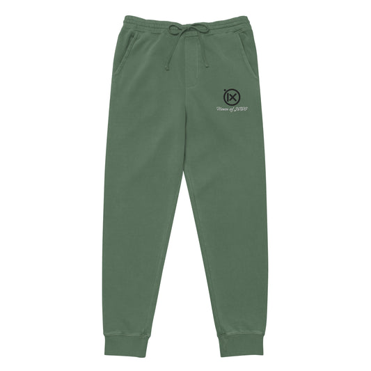 Vintage pigment sweatpants in green, elastic waistband with drawstring, cuffed hems, side logo