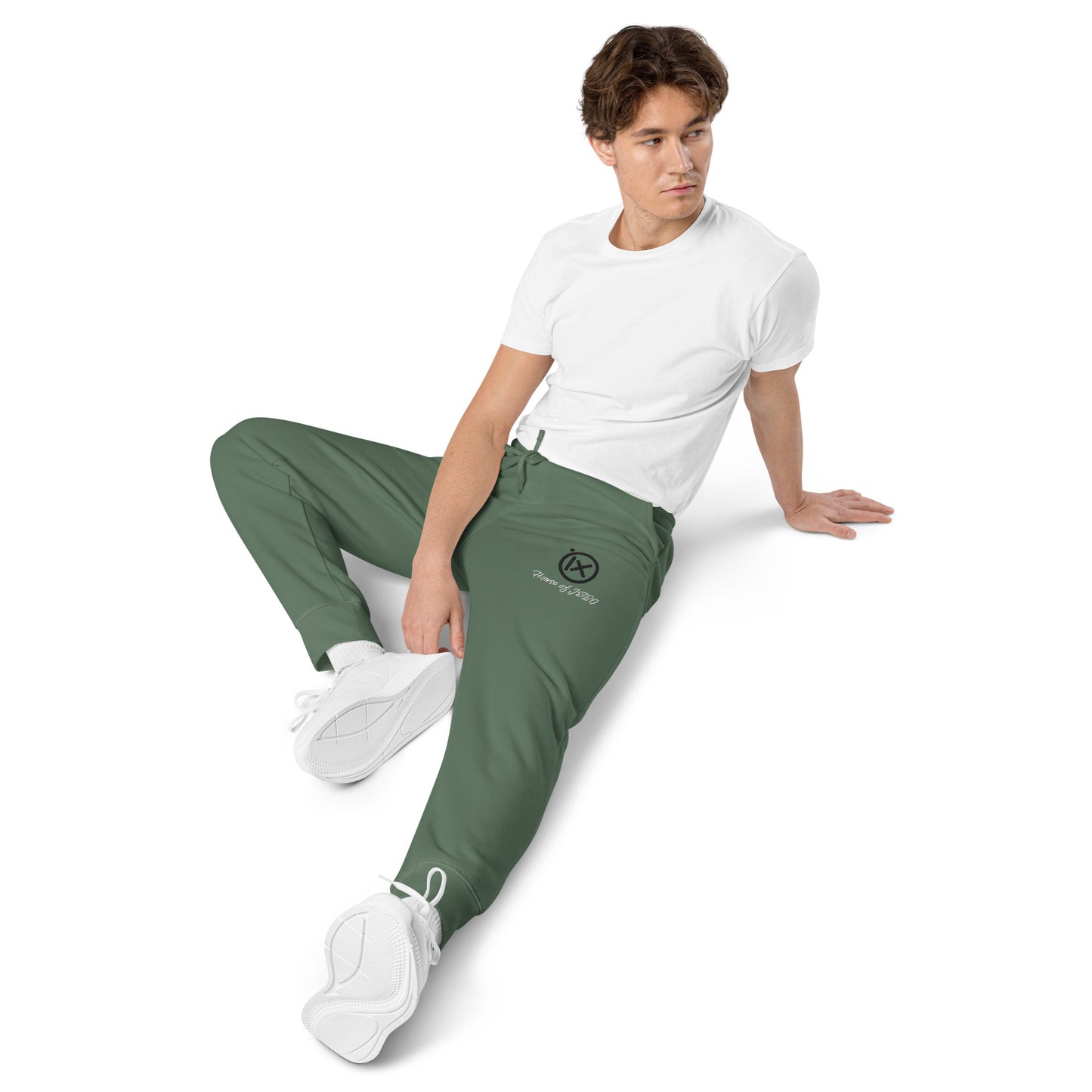 Vintage pigment sweatpants in deep green, drawstring waist and tapered cuffs