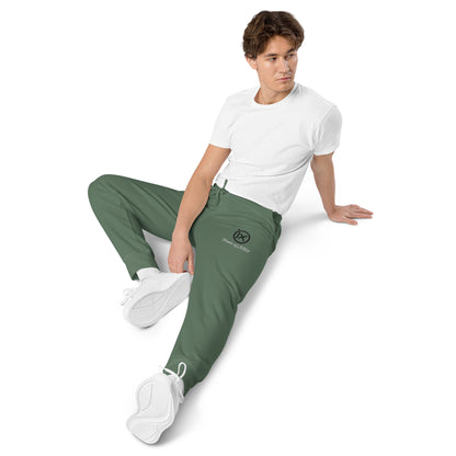 Vintage pigment sweatpants in deep green, drawstring waist and tapered cuffs