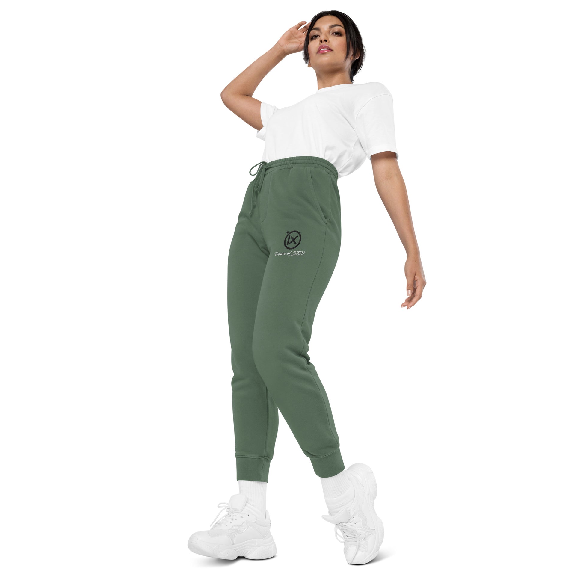Vintage pigment sweatpants in deep green, drawstring waist and logo on thigh