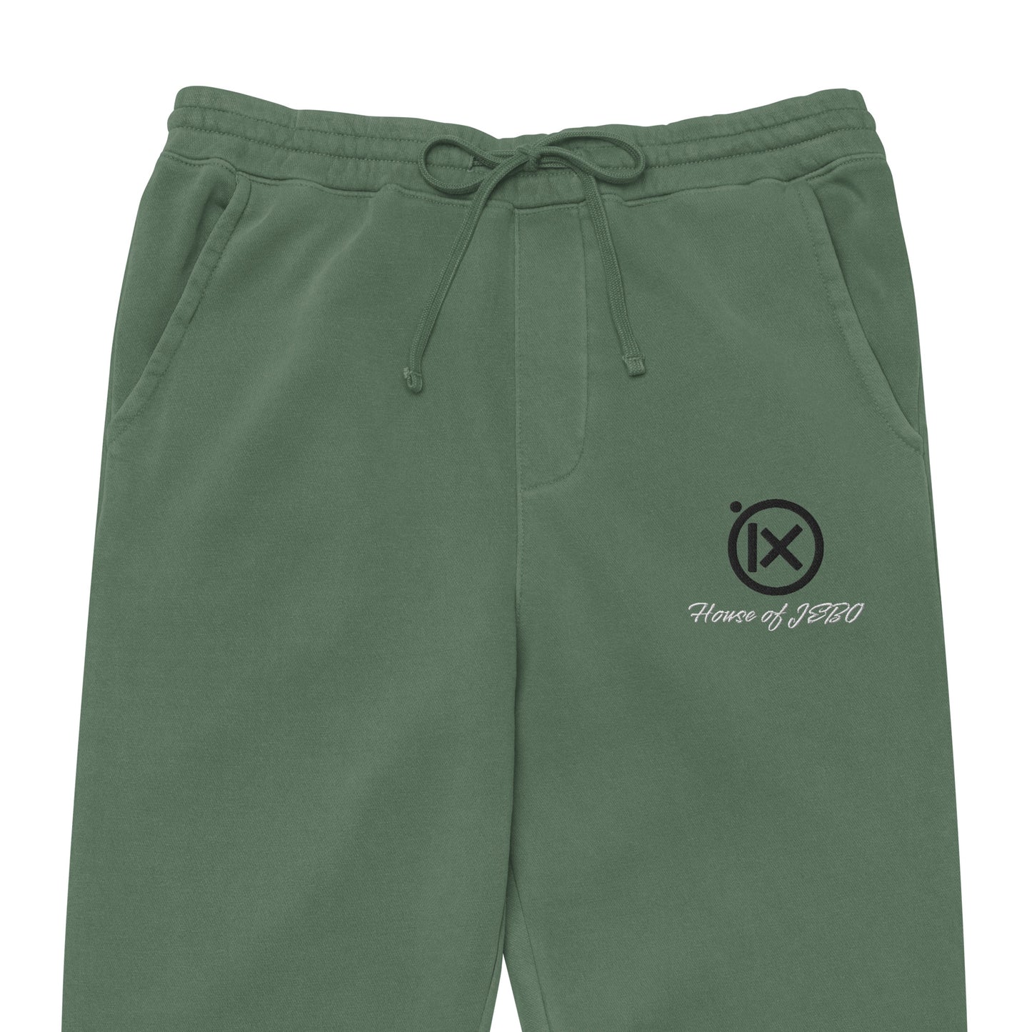 Vintage pigment sweatpants in green with drawstring waistband, side logo detail, cuffed hems