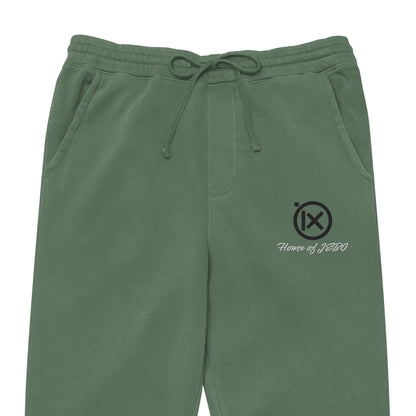 Vintage pigment sweatpants in green with drawstring waistband, side logo detail, cuffed hems