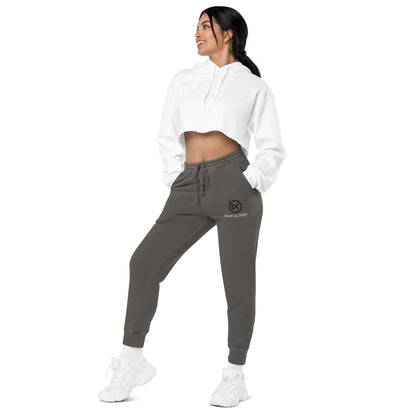 Dark gray vintage sweatpants shown from back, drawstring waist and cuffed legs