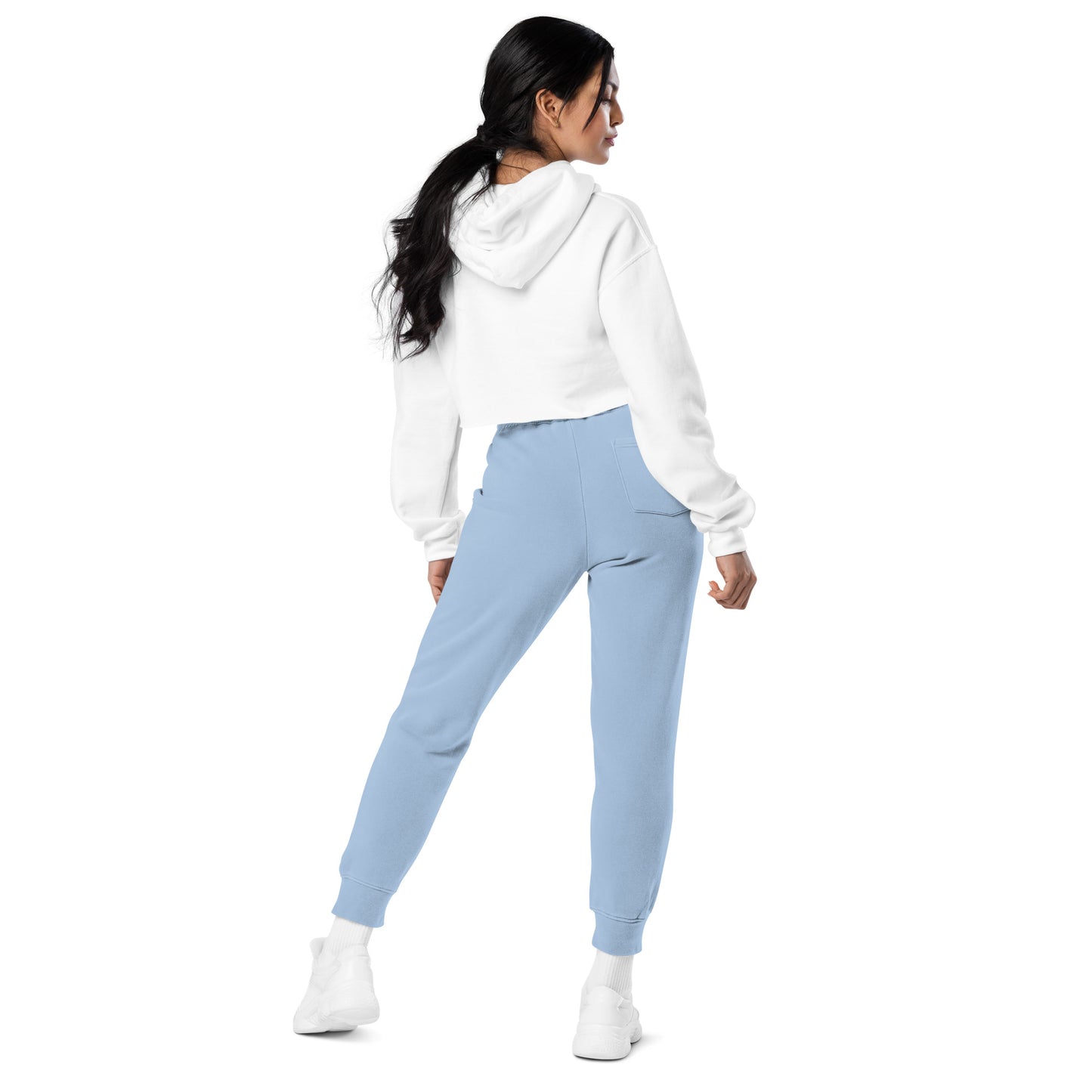 Light blue jogger sweatpants shown from side, drawstring waist and tapered ankle cuffs