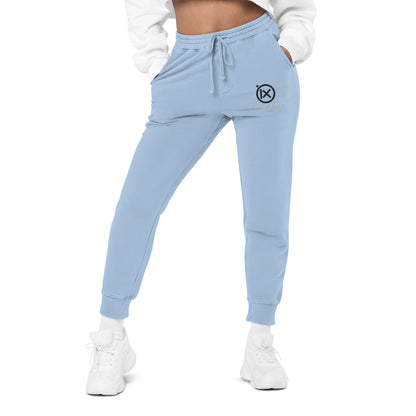 Light blue sweatpants, elastic waistband with drawstring and small side logo