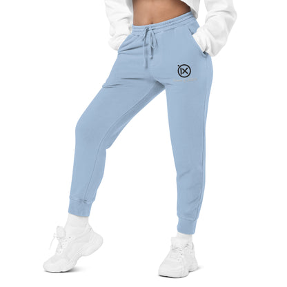 Light blue jogger sweatpants with drawstring waist and cuffed legs, side logo