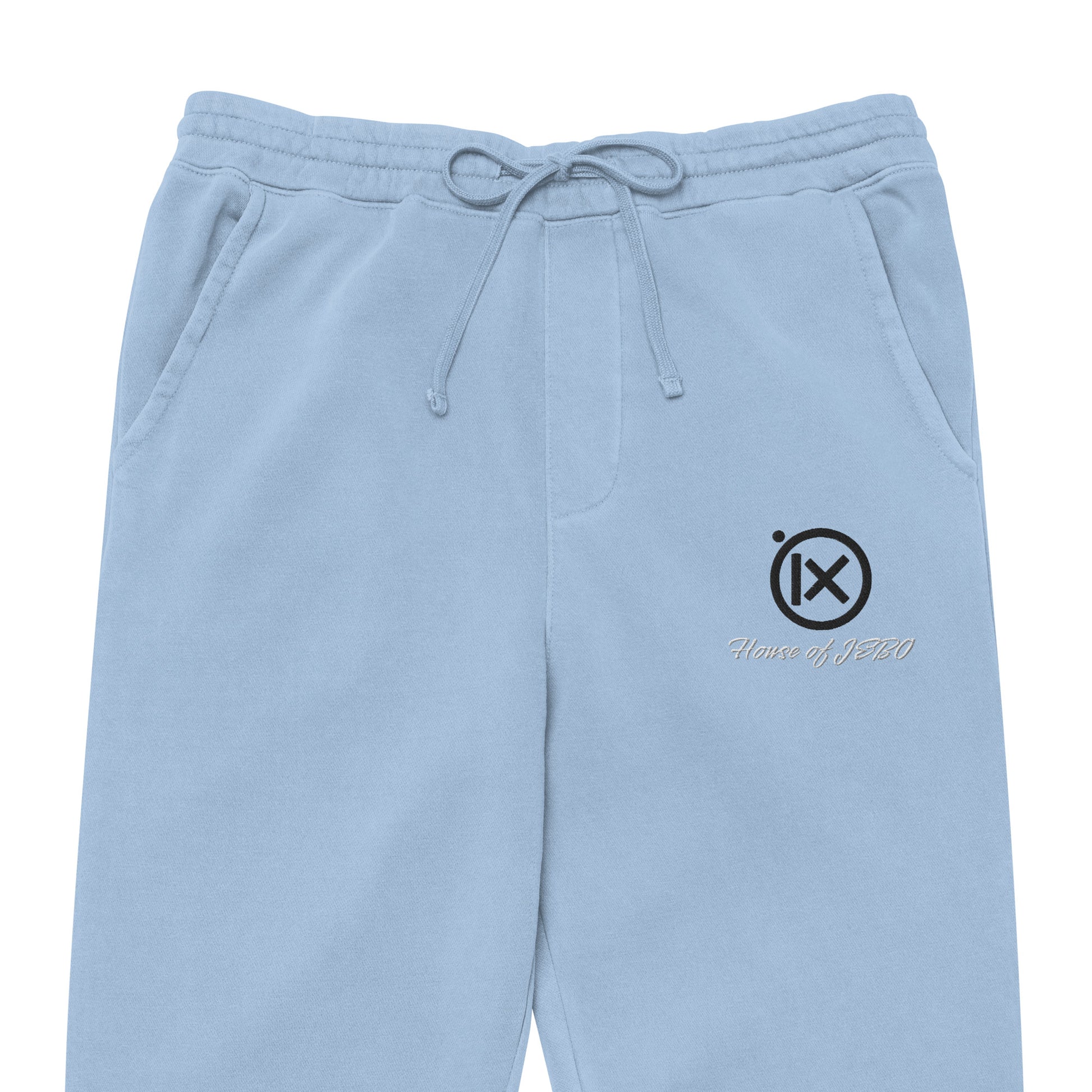 Vintage pigment sweatpants in light blue with drawstring waistband, side logo, cuffed hems